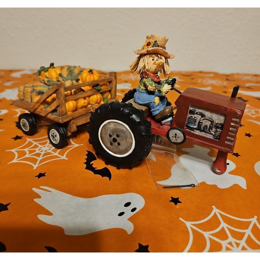 Scarecrow on Red Tractor with Pumpkin Cart Resin Figurine